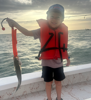 Storm clouds gathering, but the deep sea jigging must go on!