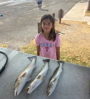 South Padre speckled trout and redfish making memories!