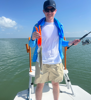 Reeling in the best fishing spots with a Spotted Weakfish off South Padre!