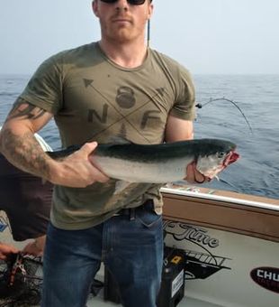 Make lasting memories on a Muskegon salmon fishing trip, whether you're a beginner or a seasoned angler.