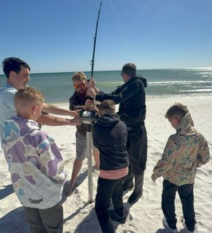 Drop Zone Shark Fishing birthday party reeling in 12 foot great white shark