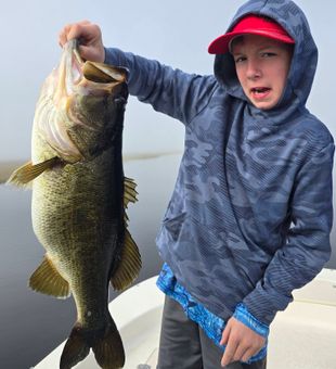 Big largemouth bass on a family fishing trip
