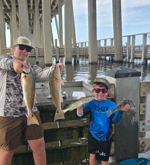 D'Iberville redfish bringing smiles to the dock!