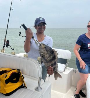 Beaming smile with a bold Sheepshead.