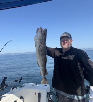 Reeling in the big one with deep sea jigging off Sooke's clear waters!