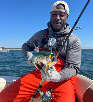 Light tackle fishing adventure in Newport - perfect conditions for an exciting day on the water!