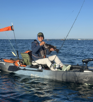 Clear skies and light tackle make for the perfect fishing day in Newport!