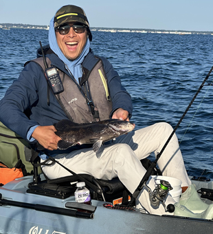 Light tackle mastery under Newport's cloudless skies!