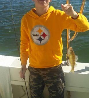 Little angler and his little fish..