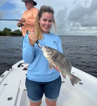 Two rods, one boat, and plenty of reasons to smile—make your next date a fishing trip in Lafitte!