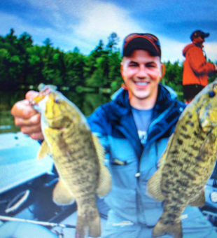 Great day on the water with these two bass! Perfect fishing conditions in Mumbai.