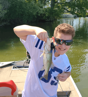 Kid Hooked a Bass in Little Creek Reservoir