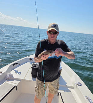 Great catch using deep sea jigging and heavy tackle in clear conditions!