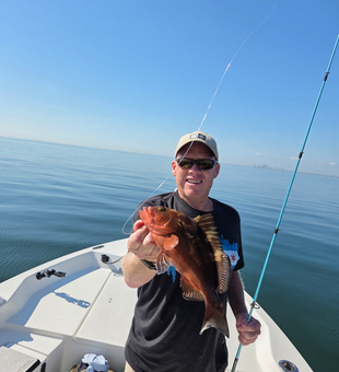 Nice red grouper caught with deep sea jigging in perfect conditions!