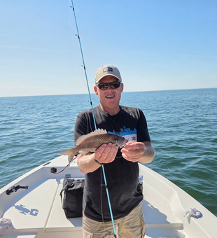 Nice White Grunt using deep sea jigging techniques in clear conditions!