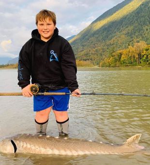 Kid Caught a Sturgeon in Seattle, WA