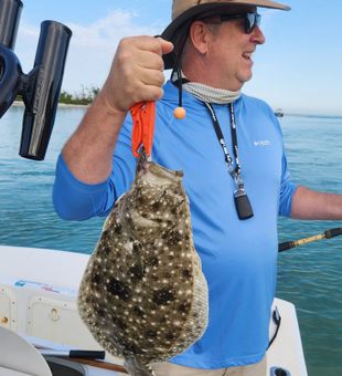 Solid Flounder catch on smooth coastal waters!