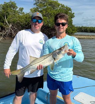Had a good day on the water with these two guys and the young man’s 30 inch snook ￼￼￼