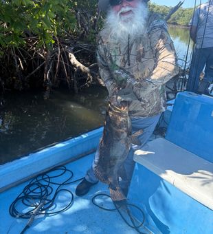Neil with a nice Goliath grouper ￼