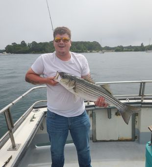 Calm waters, clear skies, fishing in Rye