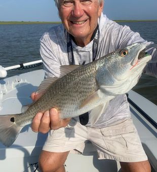 Calm waters, big redfish action