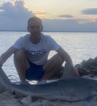 Exciting shark fishing success at sunset!