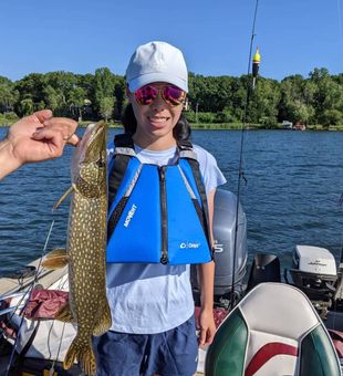 A little scared but caught her Northern Pike