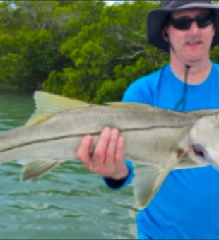 Nice Naples snook making memories on the water!