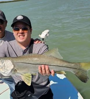 Best of Friends with their Snook! - Naples, FL.