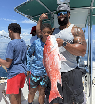 Huge Red Snapper reeled in during a deep sea adventure off Jacksonville!