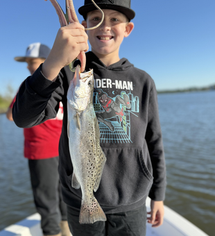 Nice speckled trout on deep sea light tackle! Afternoon cleared up perfectly for fishing.