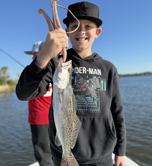 Nice speckled trout on light tackle! Clearing afternoon made for exciting fishing.