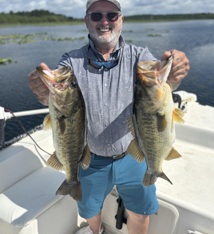 Double trouble: Largemouth Bass duo hooked on a partly cloudy day in Steinhatchee!