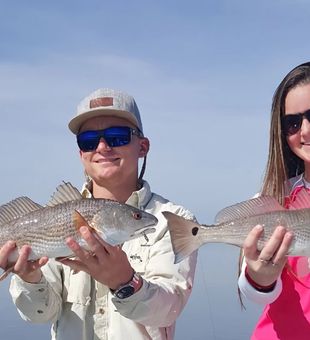 Young Anglers, both proud and happy with their catch! - New Smyrna Beach, FL.