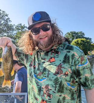 Hooked a prized smallmouth bass while trying a variety of fishing techniques in partly cloudy conditions!