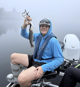 Hooked a feisty rainbow trout at 400, Boxcar Willie Drive!