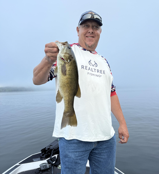 Landed a big Smallmouth Bass after a tough day on the water!