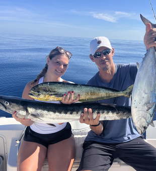 Triple threat: Little Tunny and Mahi Mahi make for an epic catch!