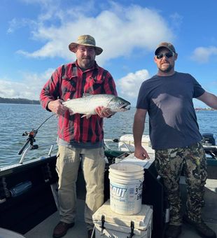 Solid catch and a proud moment on the water!