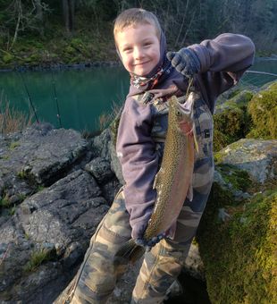 Proud moment with a beautiful rainbow trout!