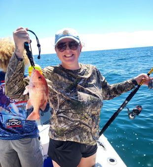 Happy angler with a beautiful red snapper catch!