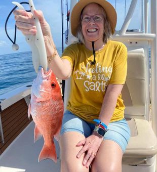 Smiling angler with Red Snapper