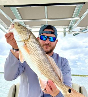 Enjoying every cast on a Palm Coast, FL fishing trip.