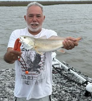 Explore the productive flats and bays of Rockport, TX, where inshore anglers can target Redfish, Speckled Trout, and Flounder on an unforgettable guided fishing trip.