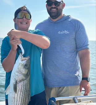 Beautiful Long Island striped bass makes the day!