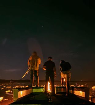 Night bowfishing on St. Johns River
