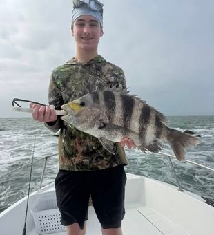 Rods bent and smiles wide while fishing the waters around Galveston Island.