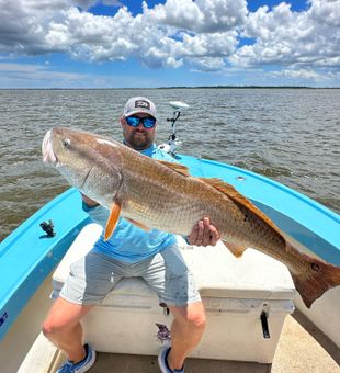 Landing redfish in Georgia’s coastal waters.