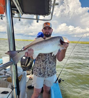 Experience world-class coastal fishing in Darien, Georgia, where redfish and trout are always biting.