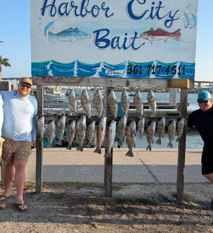 Sunrise in Rockport, Texas and a boat full of anglers ready for nonstop inshore fishing action.